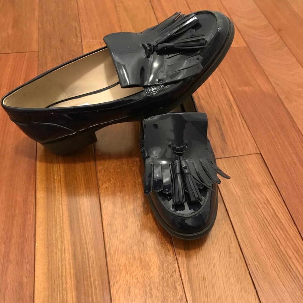 Clark’s navy blue loafers from England. Worn once.